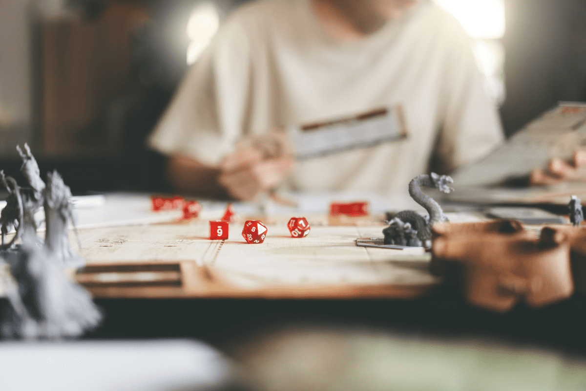 Dungeons & dragons board game with red dice